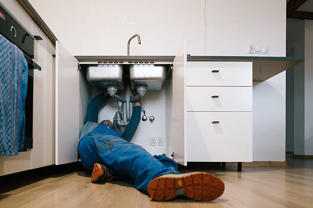 Professional Emergency Plumber technician working in Belton, MO